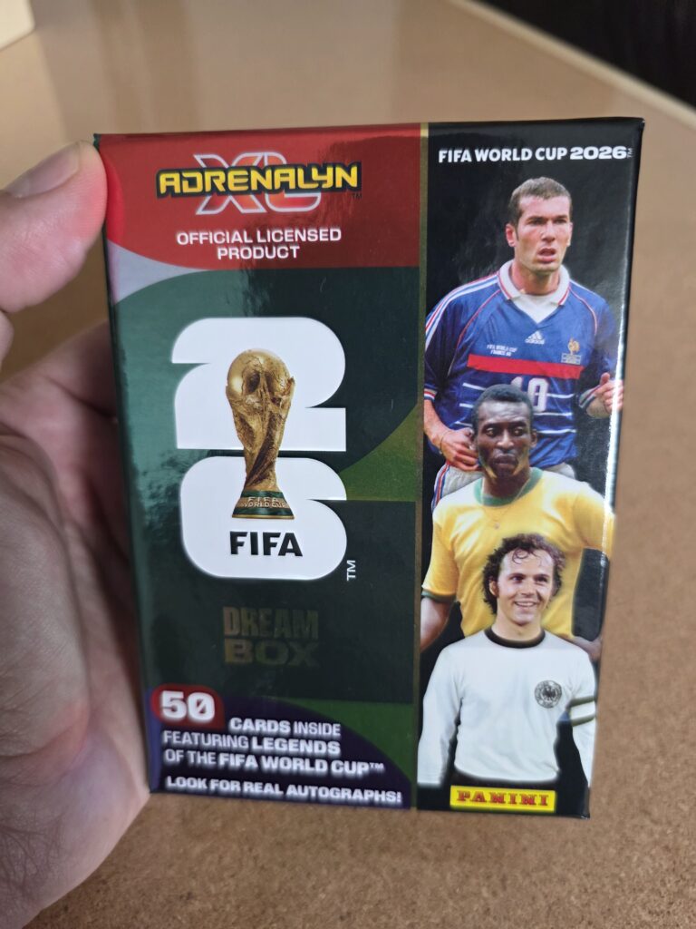 Collector holding a DREAM BOX pack in front of the camera